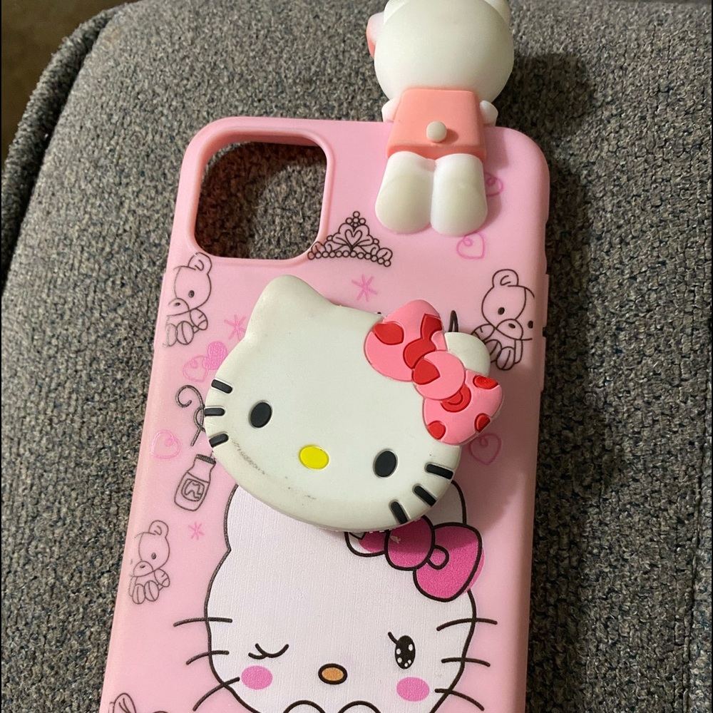 iPhone 11 Pro Max case with attached pop socket.